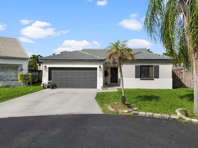 7544 SW 157th Court, sold in Weitzer Lago Mar Homes, Miami, FL