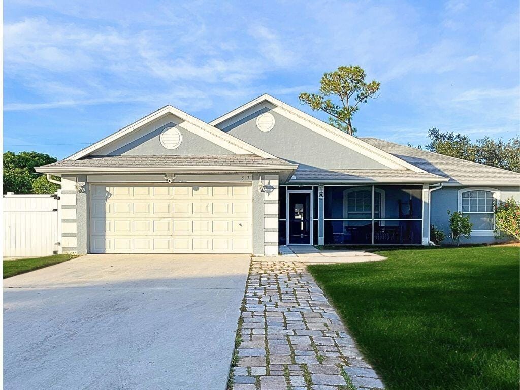 517 NW Sherbrooke Avenue, Port St. Lucie, FL 34983