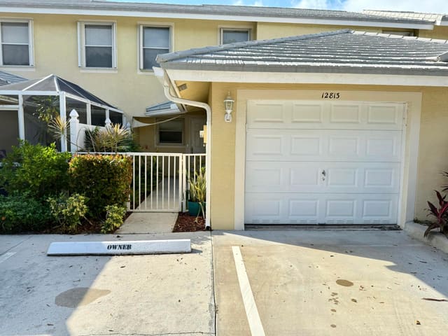 12813 Woodmill Drive, sold in Westwood Lakes, Palm Beach Gardens, FL