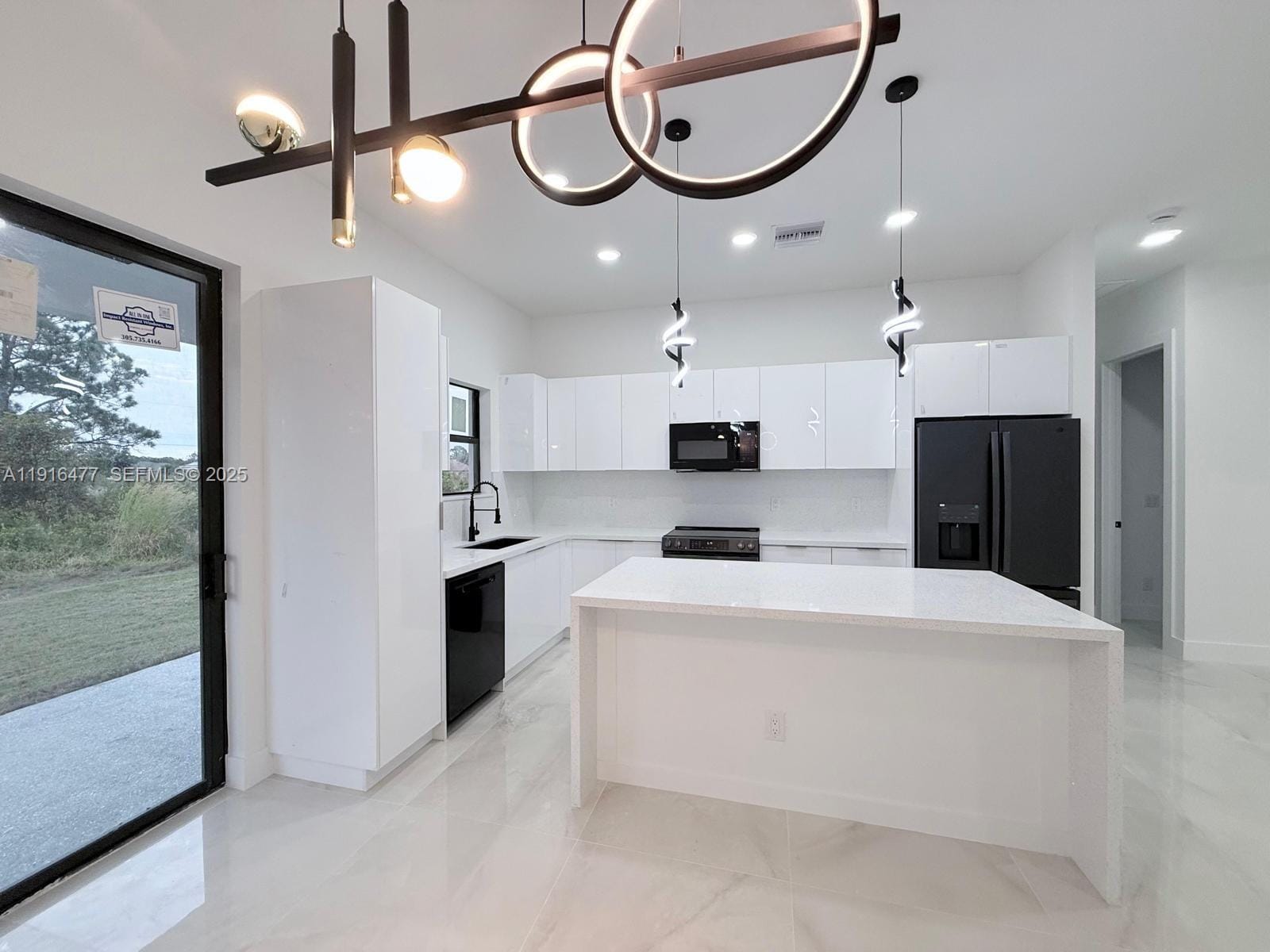 2614 45 Street W — photo 2