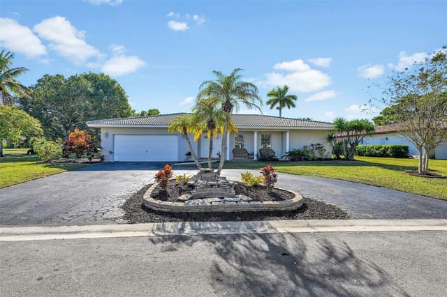 8579 NW 27th Drive, sold in Forest Hills, Coral Springs, FL