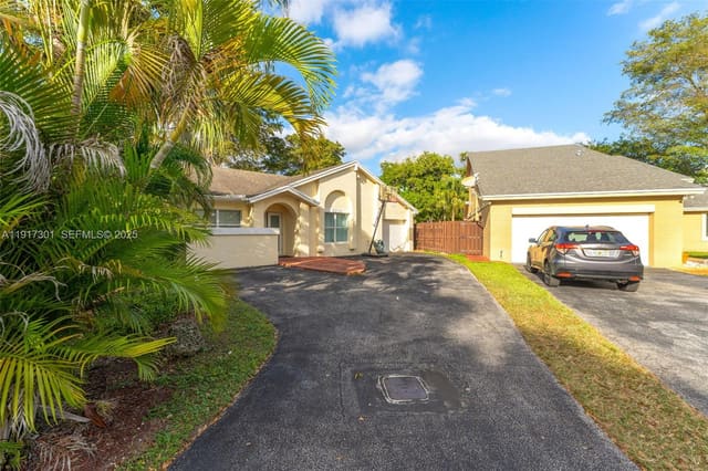 5110 SW 153rd N Place, sold in Lakes Of The Meadow Sec 4, Miami, FL