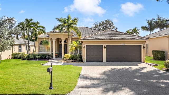 12040 NW 49th Drive, sold in Wyndham Lakes Central, Coral Springs, FL