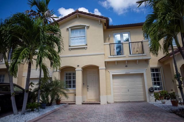 12847 SW 133rd Street, sold in Courts At Tuscany, Miami, FL
