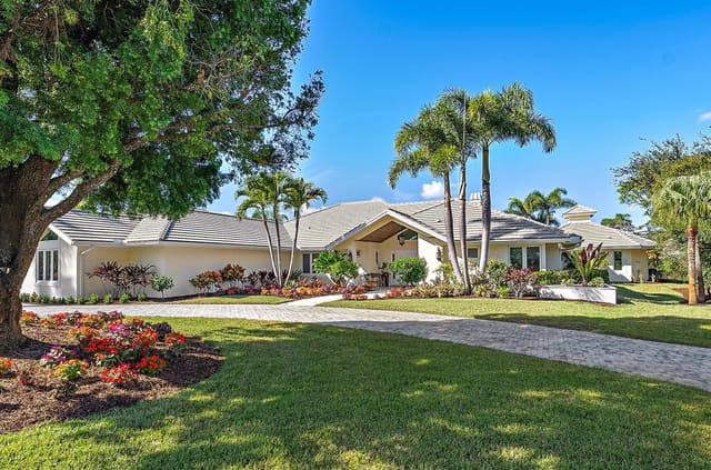 2500 NW Hollyberry Lane, sold in Harbour Ridge Plat No 1, Palm City, FL