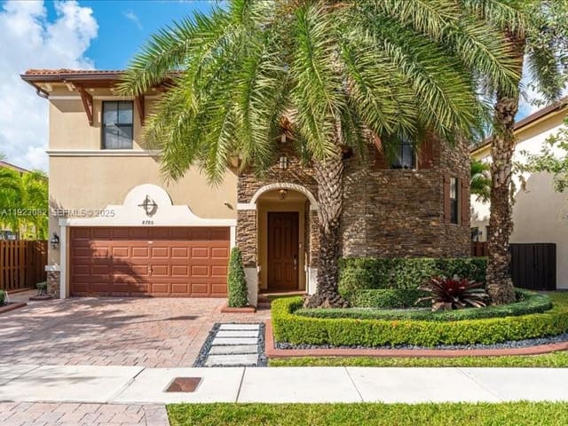 8780 NW 98th Court, sold in Doral Breeze, Doral, FL