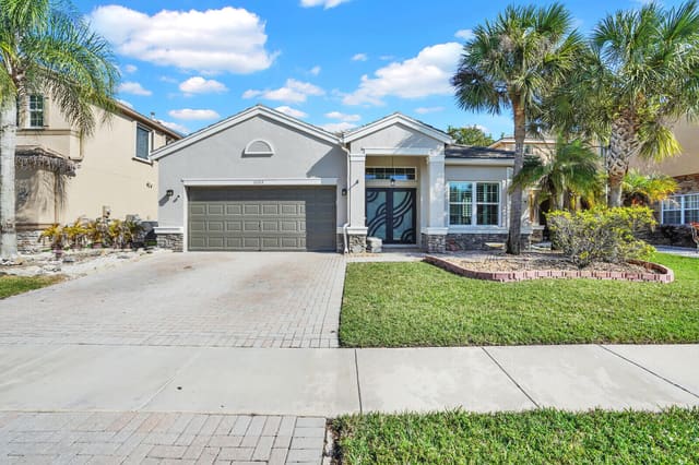 10105 Clubhouse Turn Road, sold in Thoroughbred Lake Estates 2, Lake Worth, FL