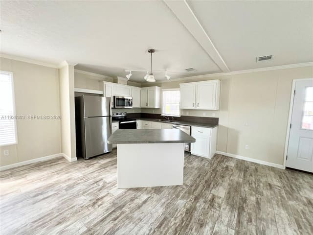 3210 Royal Palm Court, sold in Ravenswood Estates & Mari, Dania Beach, FL