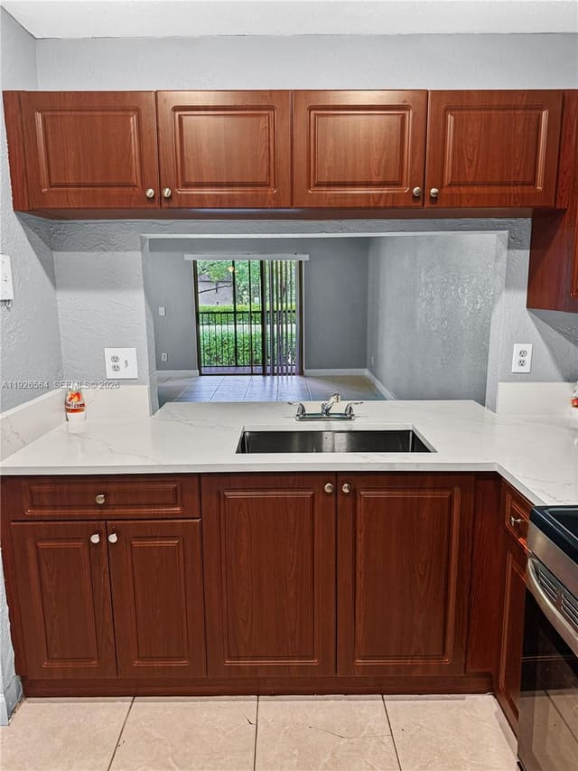 10313 NW 8th Street 205, sold in Bella Grand Condo, Pembroke Pines, FL