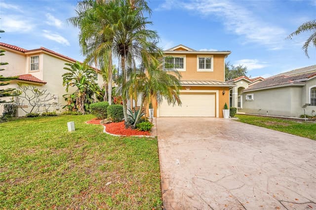 4941 Pelican Street, sold in Regency Lakes At Coconut, Coconut Creek, FL