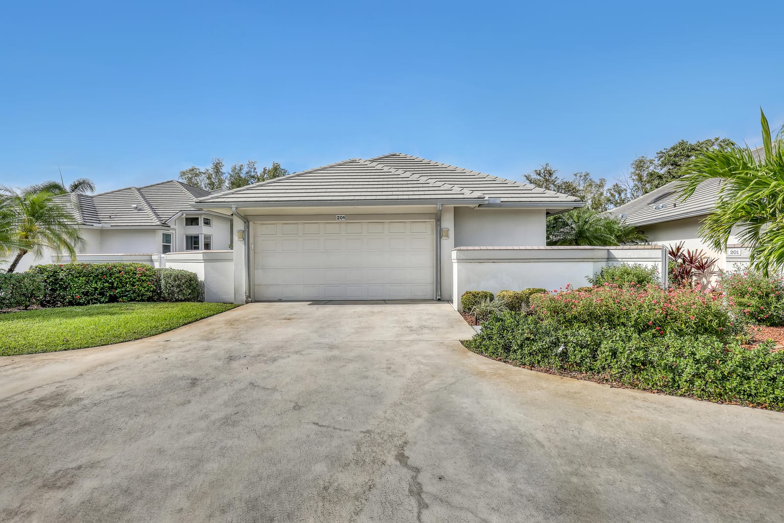 201 Orange Tree Drive, Atlantis, FL 33462