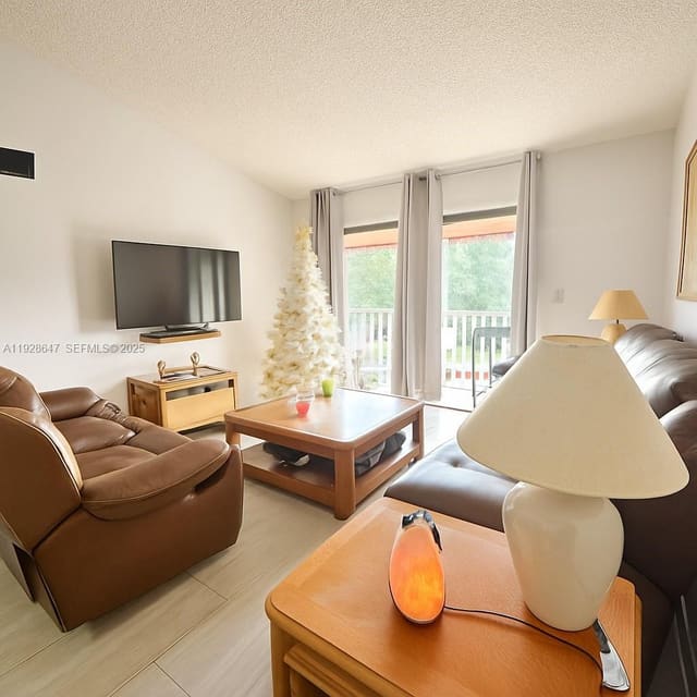 15530 SW 80th Street C-301, sold in The Courts At Kendall Con, Miami, FL