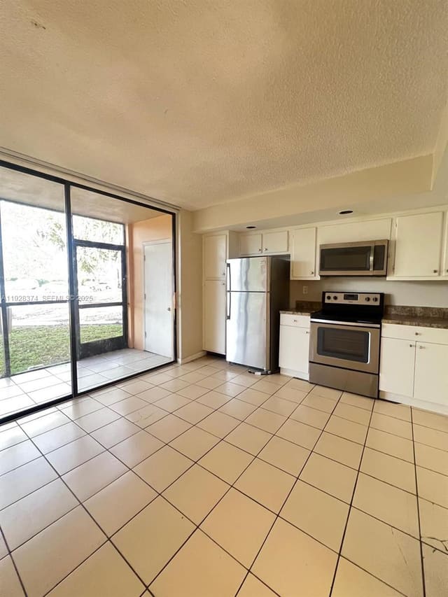 8600 SW 133rd Ave Road 107, sold in Horizons West Condo, Miami, FL