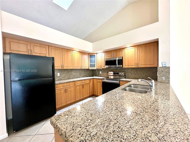 3030 NW 116th Avenue, sold in Coral Springs Country Clu, Coral Springs, FL