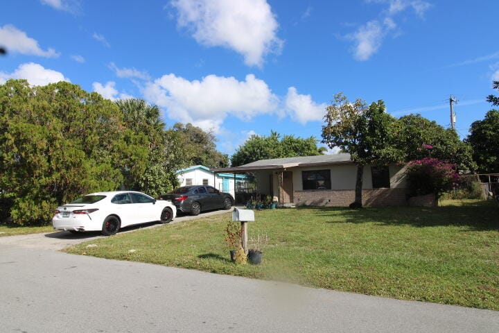 5702 Briarwood Street, Mangonia Park, FL 33407