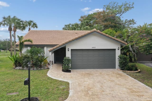 1410 Riverwood Lane, sold in Ramblewood Villas, Coral Springs, FL