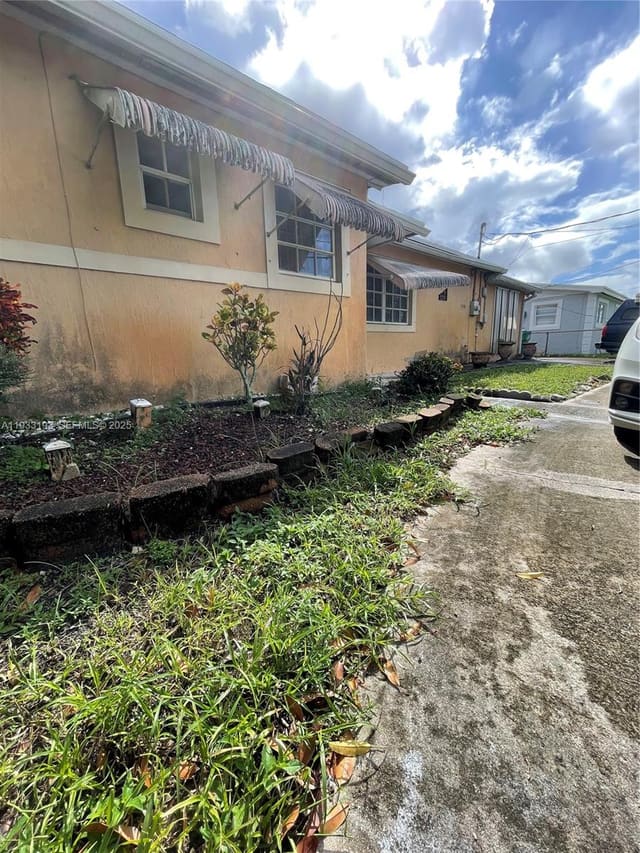 2210 NW 175th Street, sold in Myrtle Grove 2nd Addn, Miami Gardens, FL