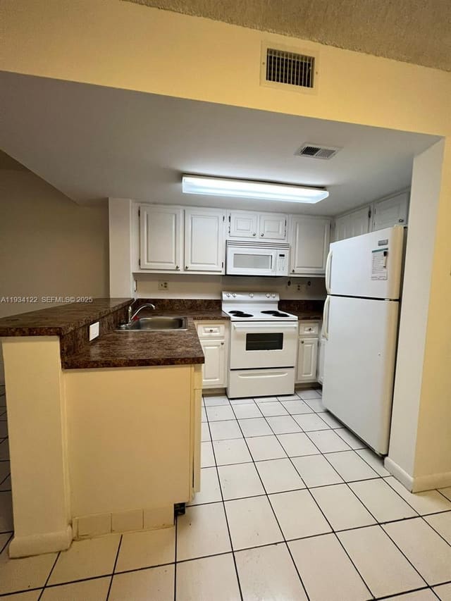 8660 NW 5th Terrace 15107, sold in Coral Pointe Townhomes Co, Miami, FL