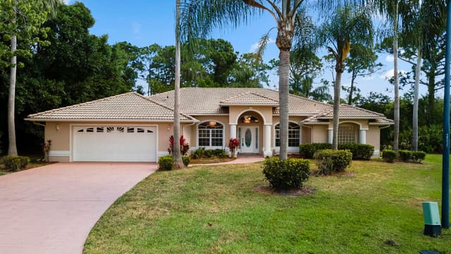 1698 SW Mockingbird Drive, sold in Country Club Pointe, Port St Lucie, FL