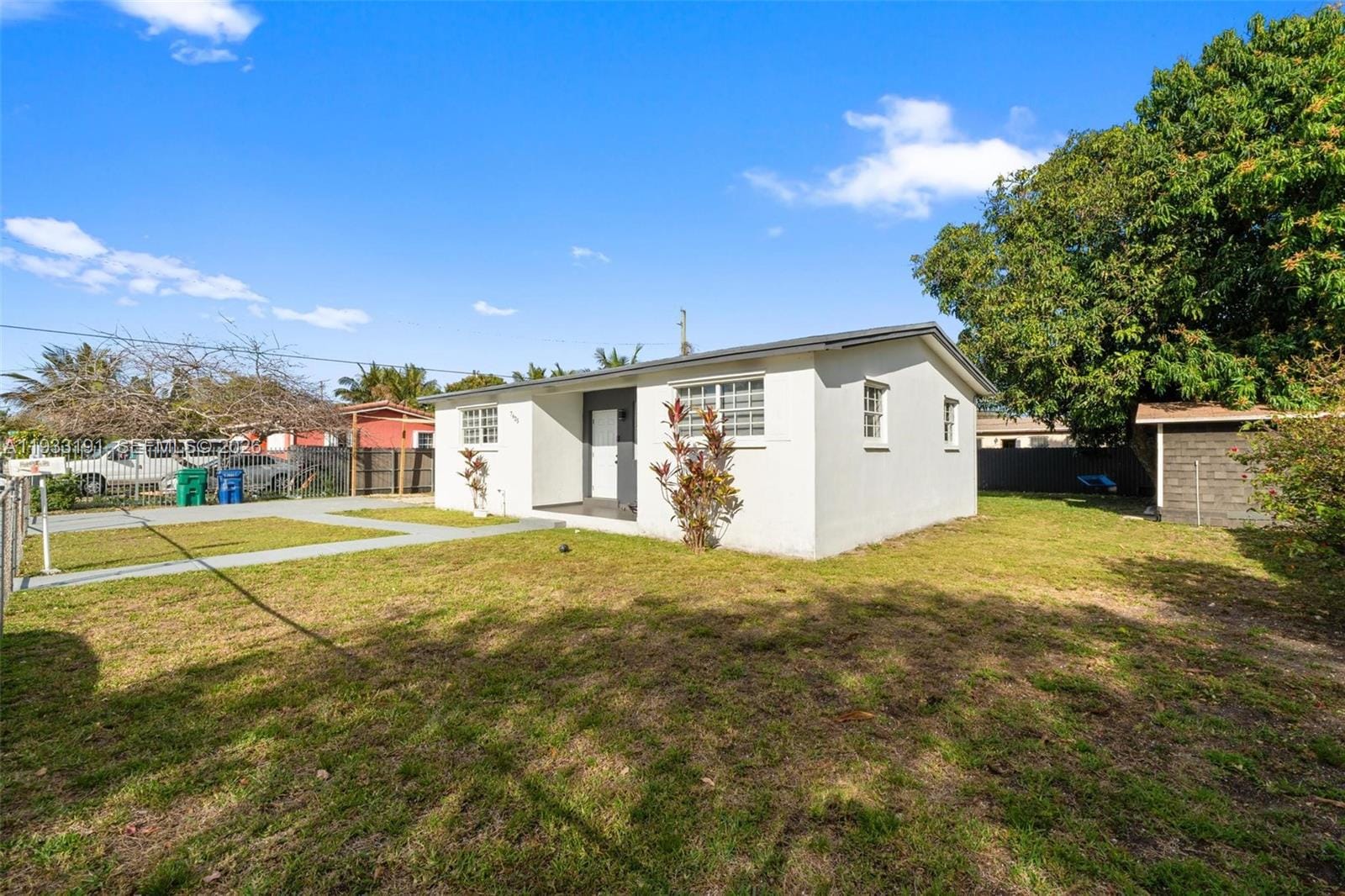 7625 NW 14th Court — photo 2