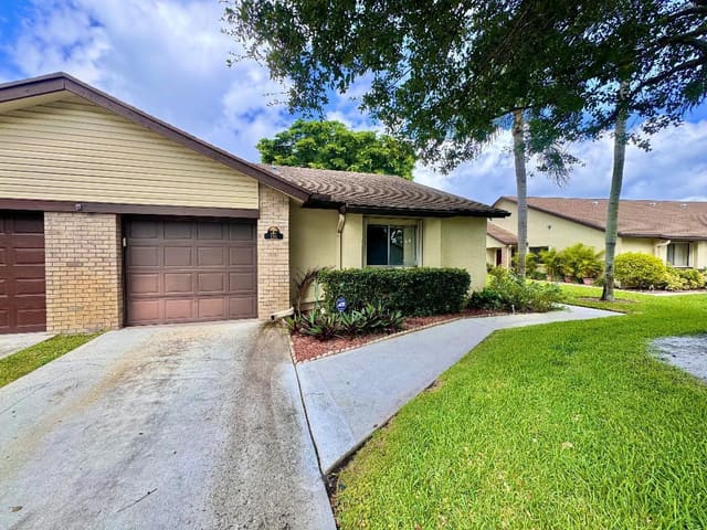 116 Village Walk Drive, sold in Village Walk, Royal Palm Beach, FL