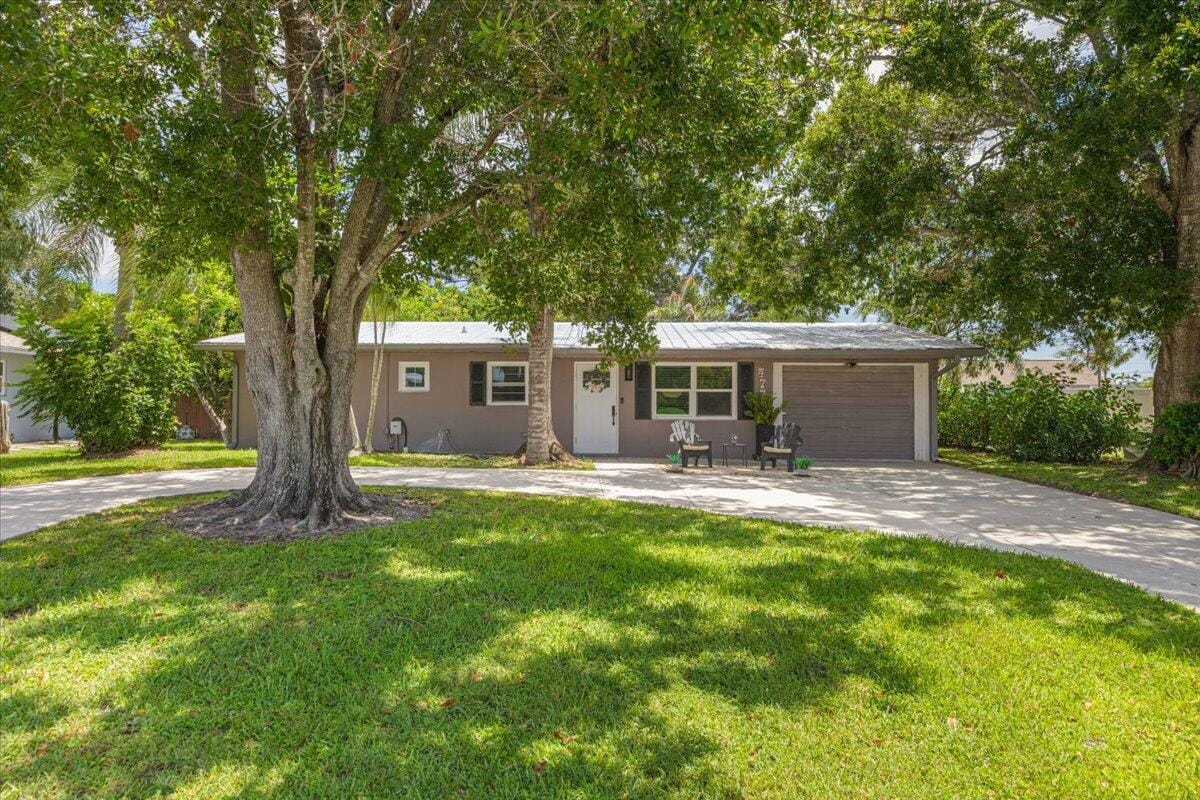477 SE Asbury Lane, Port St. Lucie, FL 34983