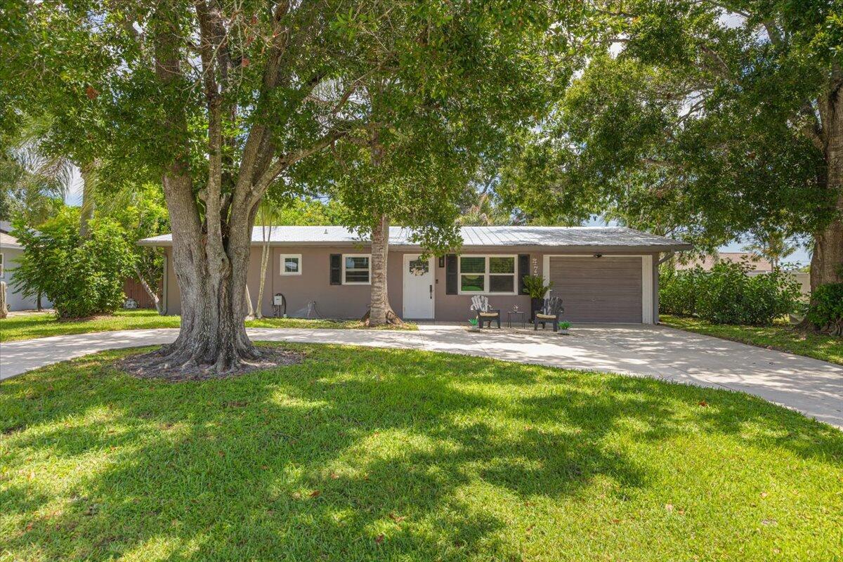 477 SE Asbury Lane, Port St. Lucie, FL 34983