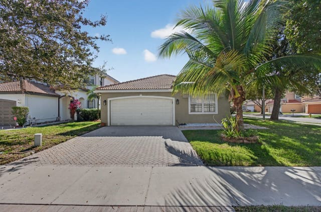 4064 Crescent Creek Drive, sold in Coconut Point, Coconut Creek, FL