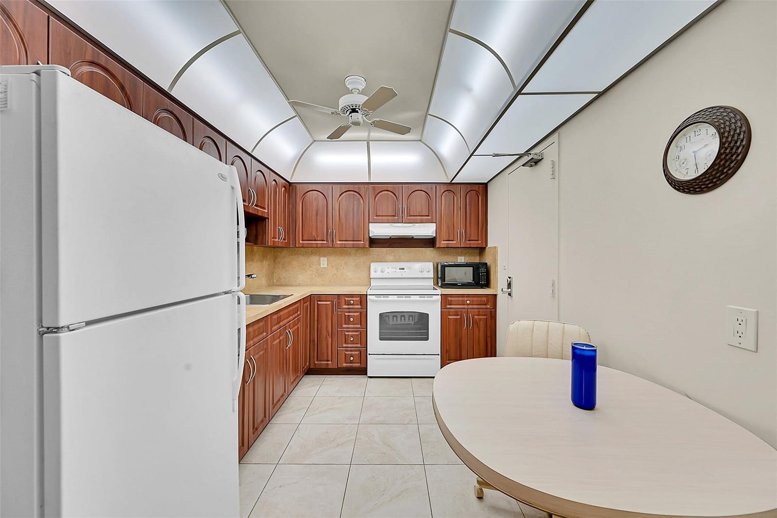 10777 W Sample Road 408 — photo 4