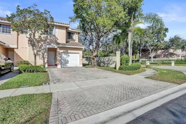 9175 NW 40th Place, sold in Next Sunrise Ensemble, Sunrise, FL