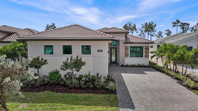 13924 Vivant Drive, sold in L'Ambiance At Avenir, Palm Beach Gardens, FL