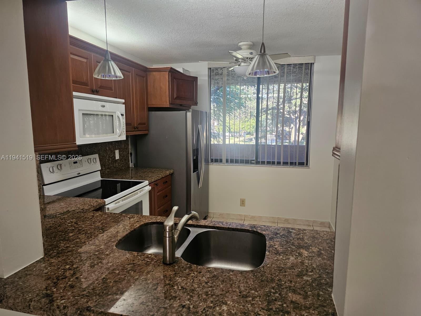 8592 W Sunrise Boulevard 209 — photo 3
