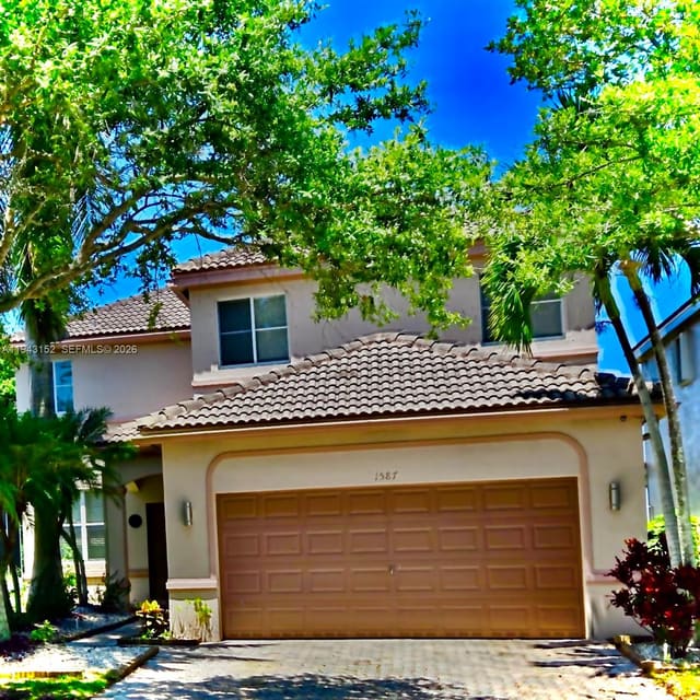 1587 Winterberry Lane, Weston, FL 33327