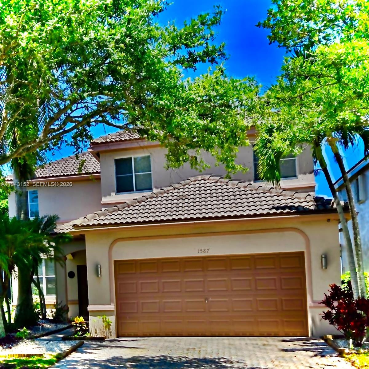 1587 Winterberry Lane, Weston, FL 33327