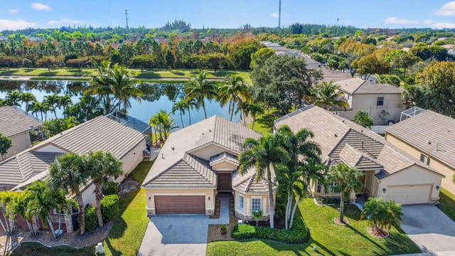 10202 Clubhouse Turn Road, sold in Thoroughbred Lake Estates, Lake Worth, FL