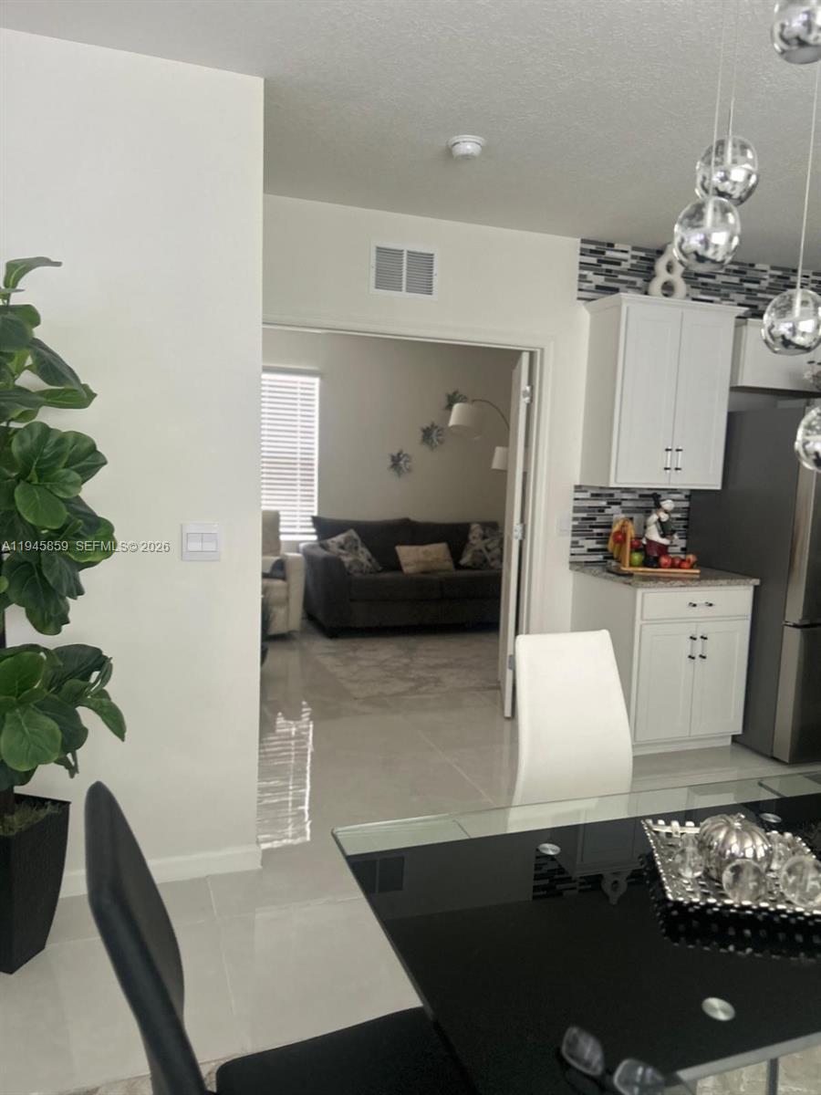 12422 SW Rimini Way — photo 3