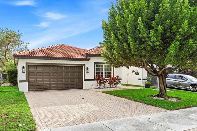 4052 Crescent Creek Place, sold in Coconut Point, Coconut Creek, FL