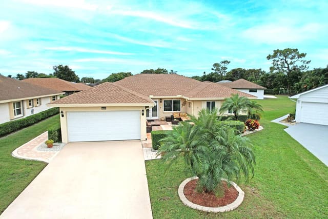10668 S Greentrail Drive S, sold in P T V, Boynton Beach, FL