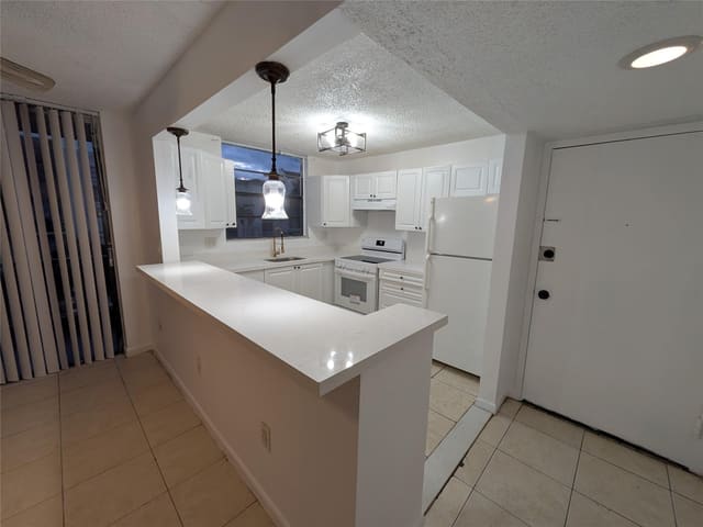 1788 NW 55th Avenue 204, sold in Tree Garden Condo, Lauderhill, FL
