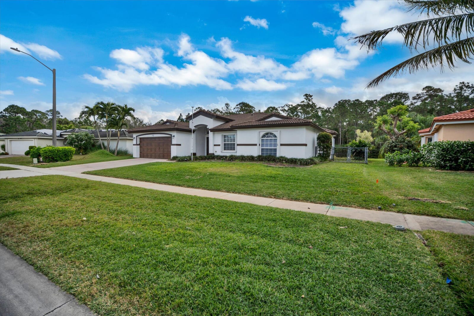 112 Cocoplum Circle — photo 2