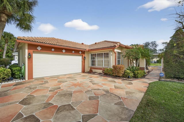 8888 Odell Drive, sold in Lansdowne, Boynton Beach, FL