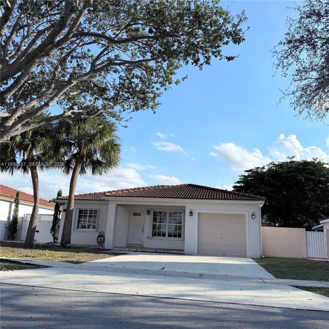 9130 NW 193rd Street, sold in Lakes On The Green North, Hialeah, FL
