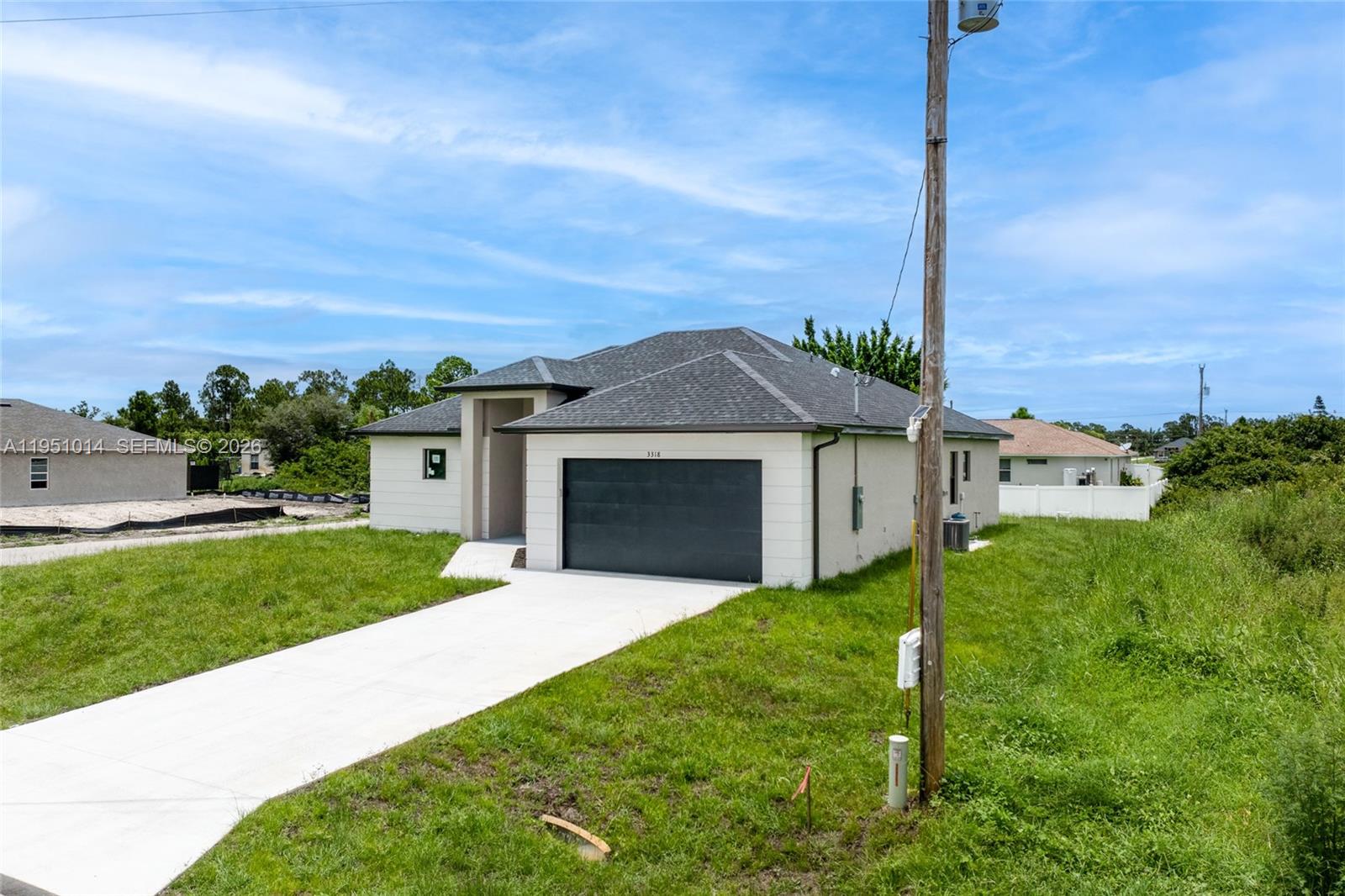 3318 30th Street SW, Lehigh Acres, FL 33976 photo 5