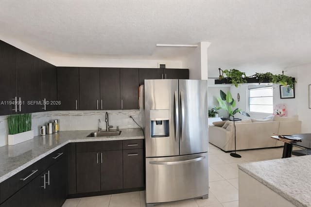 661 NE 195th Street 103, sold in Coco Wood Condo, Miami, FL