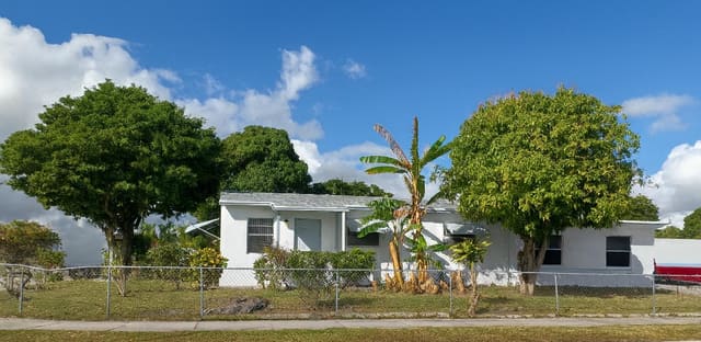 1060 W 26th Court, sold in Monroe Heights, Riviera Beach, FL
