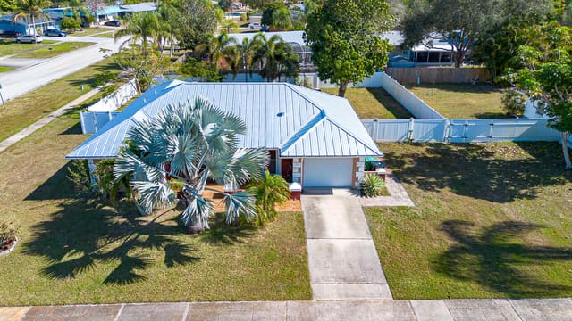 397 NE Jonquil Street, sold in Port St Lucie Floresta Pines Unit 2, Port St Lucie, FL