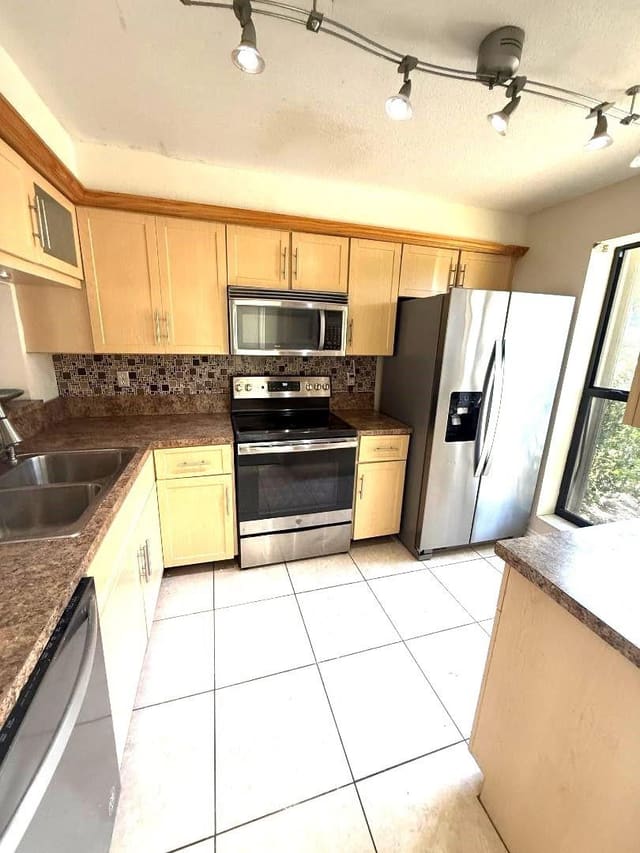 3070 S Oakland Forest Drive 306, sold in Pines West, Oakland Park, FL