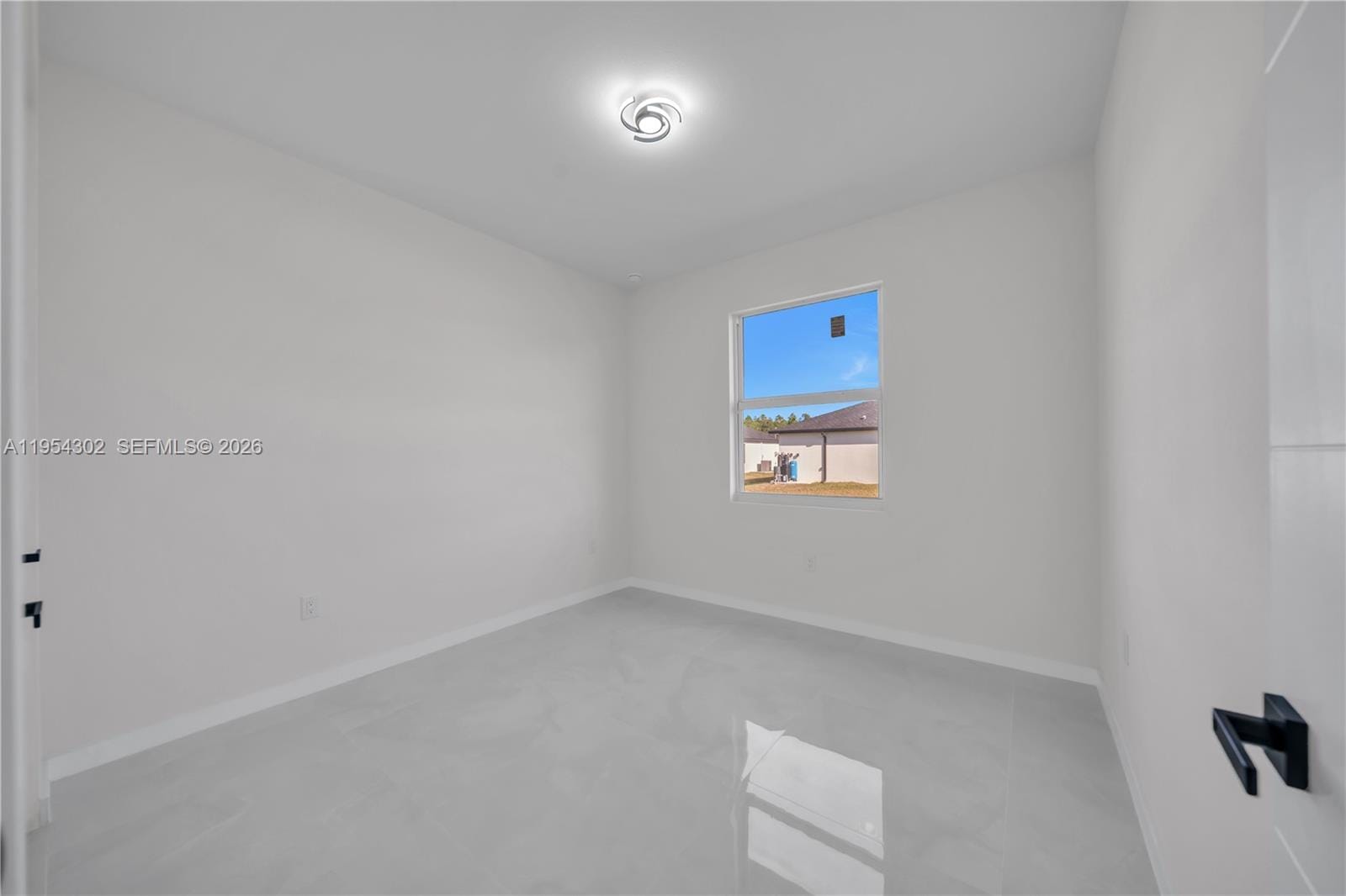 1930 Zombar Court, Lehigh Acres, FL 33972 photo 15