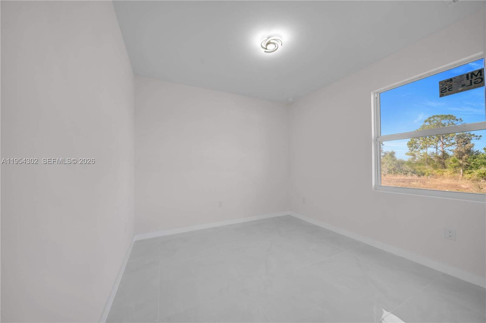 1930 Zombar Court, Lehigh Acres, FL 33972 photo 22