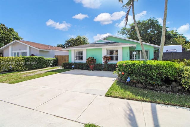 11942 SW 210th Street, sold in Strawberry Field Sub, Miami, FL